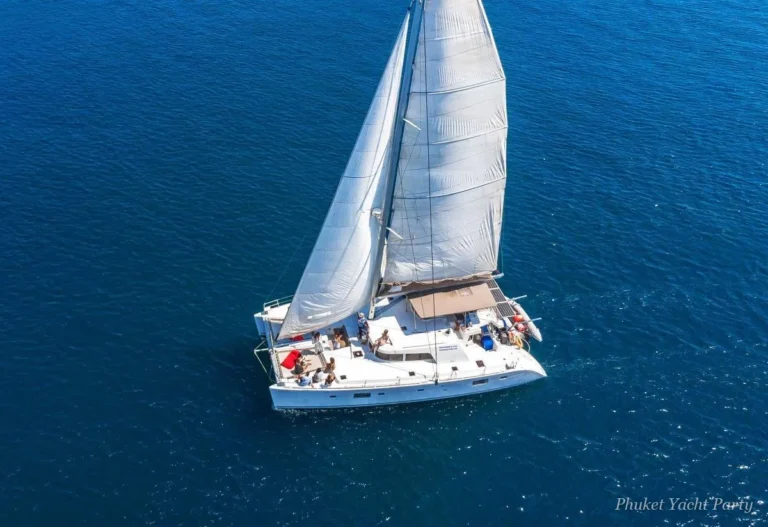 Neon Tide 50 sailing catamaran set up for a day party off Phuket
